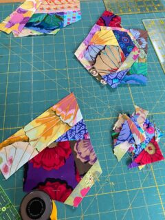 Once the sun comes out it’s always a dilemma whether I garden or sew but have managed to do some of each so far this week. My improv scrappy squares are coming along and I’m making even more scraps! Hope the sun is shining where you are. 
#scrappyquilt #improvpiecing